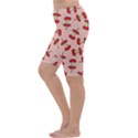 Red Apple Core Funny Retro Pattern Half eaten on pastel orange background Cropped Leggings  View2