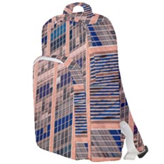 Low Angle Photography Of Beige And Blue Building Double Compartment Backpack by Pakrebo