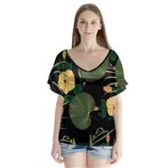 Tropical Vintage Yellow Hibiscus Floral Green Leaves Seamless Pattern Black Background  V-neck Flutter Sleeve Top by Sobalvarro