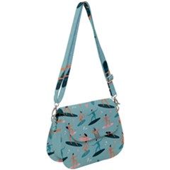 Beach-surfing-surfers-with-surfboards-surfer-rides-wave-summer-outdoors-surfboards-seamless-pattern- Saddle Handbag by Jancukart